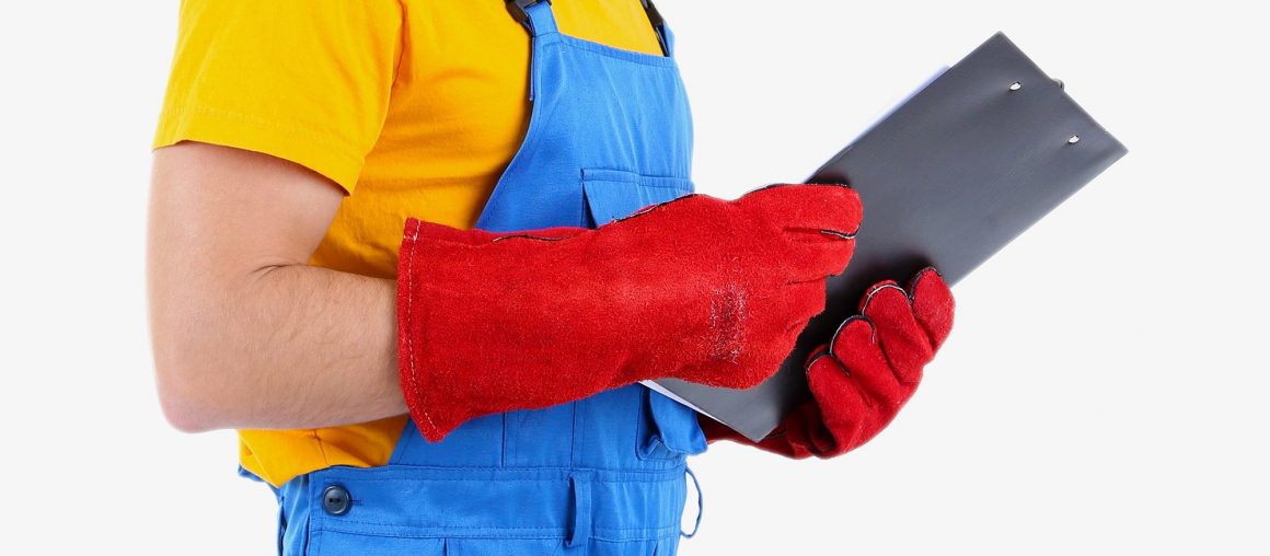 Young worker isolated on white